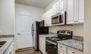 Fully Equipped Kitchen at The Arbor Walk Apartments, Tampa, Florida